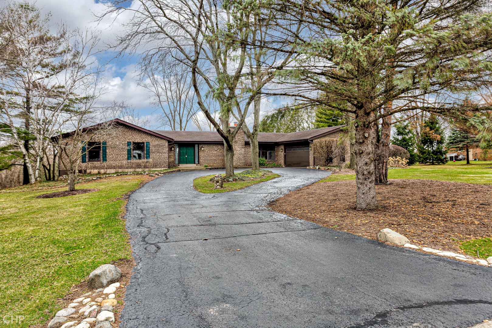 3027 Red Barn Road Crystal Lake, IL 60012 - Photo 39 of 40 a front view of a house with a yard and tree s