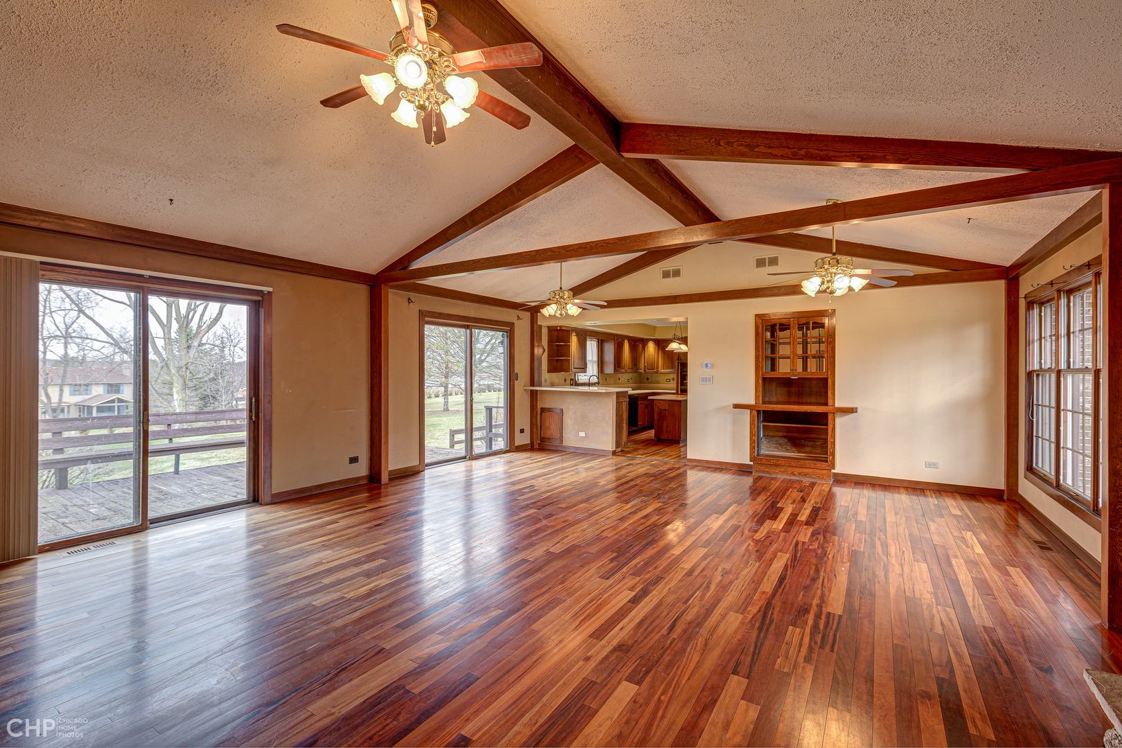 3027 Red Barn Road Crystal Lake, IL 60012 - Photo 9 of 40 a view of empty room with wooden floor and fan
