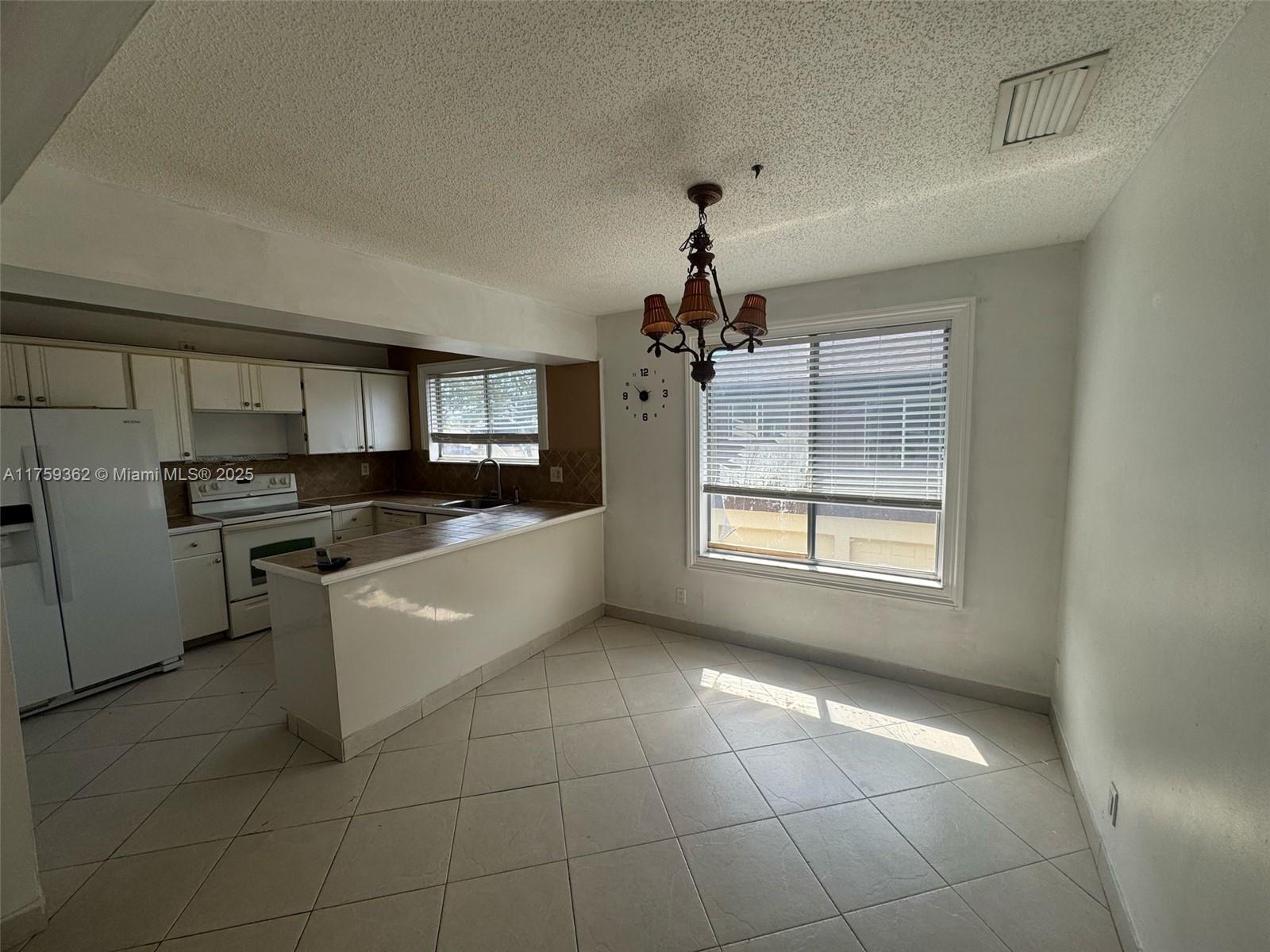 5344 Bosque Lane, Unit 104 West Palm Beach, FL 33415 - Photo 1 of 13
