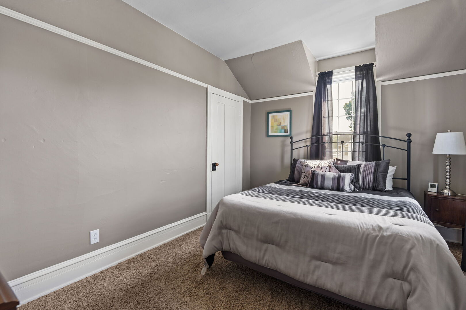 417 North State Street Geneseo, IL 61254 - Photo 27 of 51 a bedroom with a bed and window