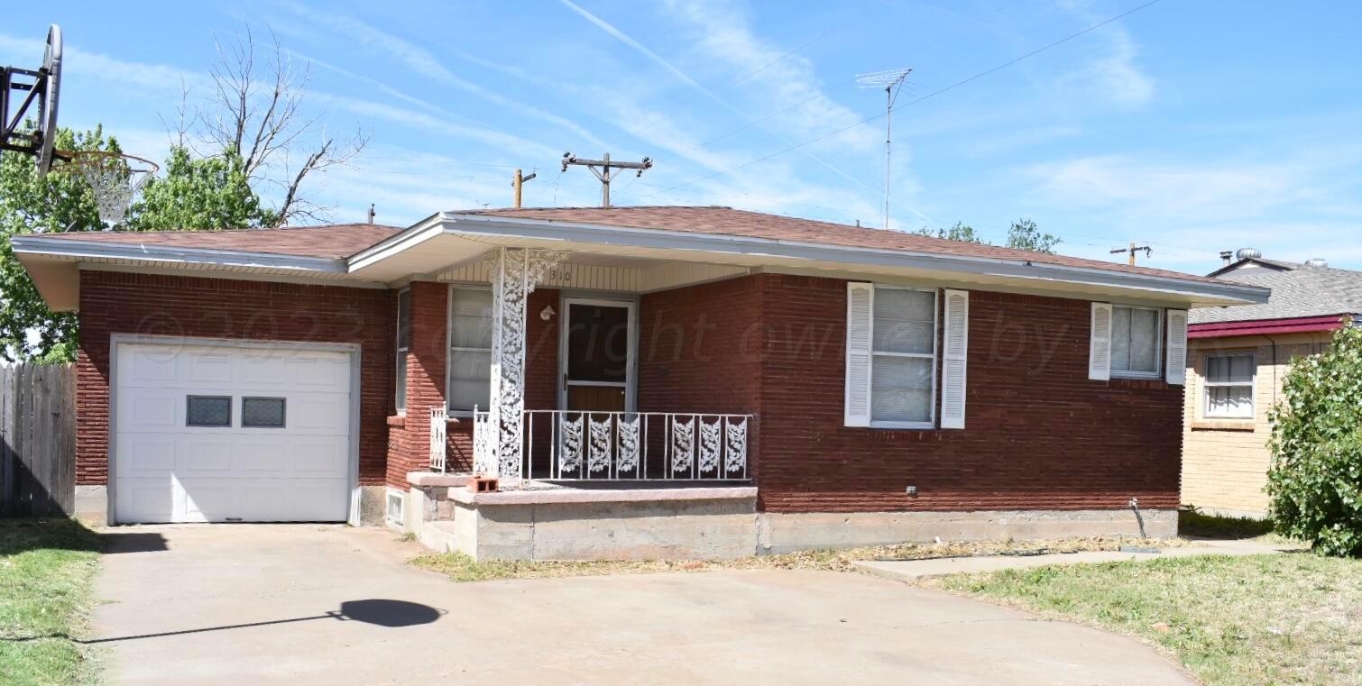 310 Santa Fe Street Borger, TX 79007 - Photo 2 of 18 a view of a house with a yard and sitting space