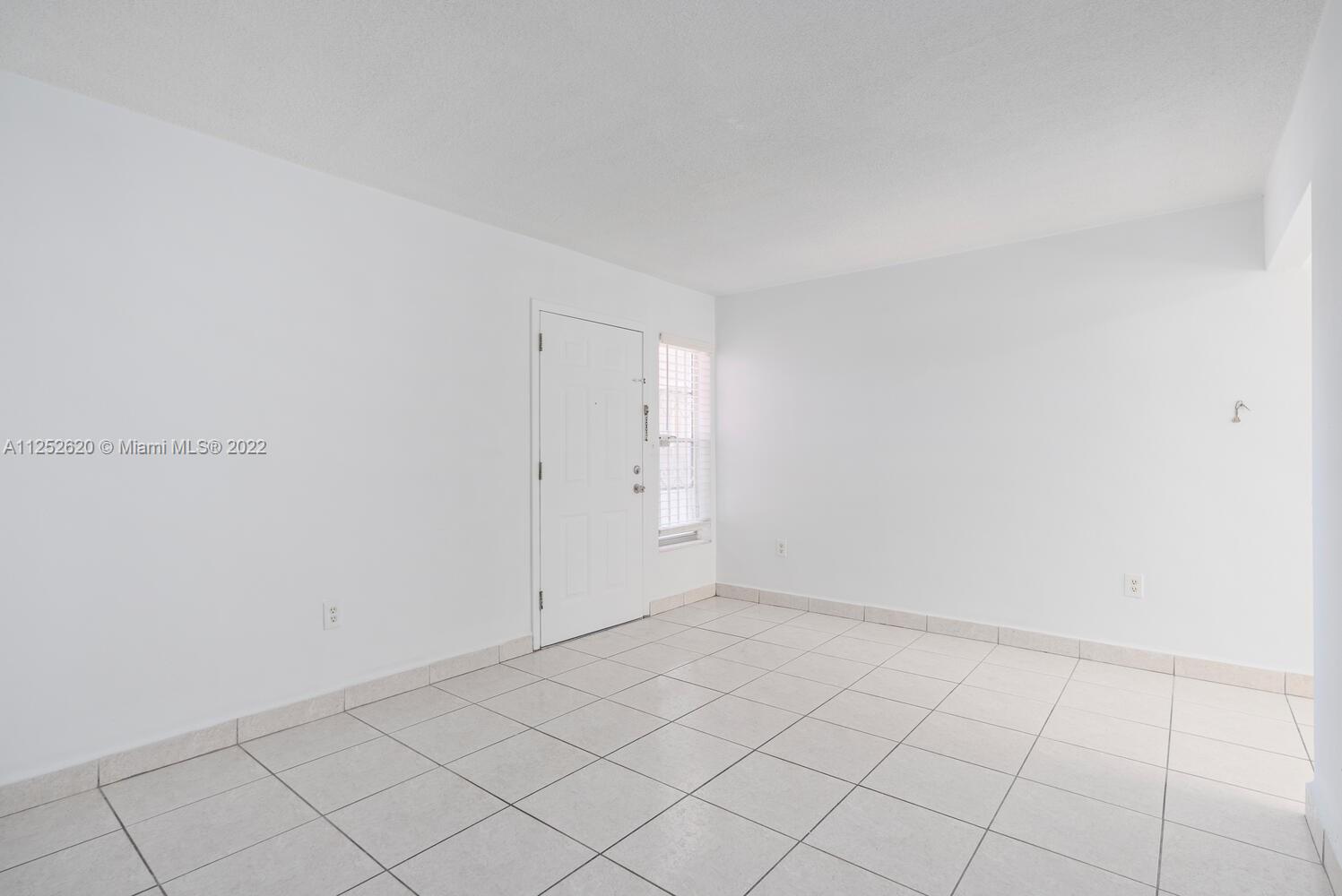 1390 Northwest 2nd Street, Unit 2 Miami, FL 33125 - Photo 5 of 10 a view of an empty room