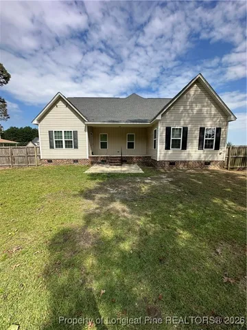 a house view with a garden space