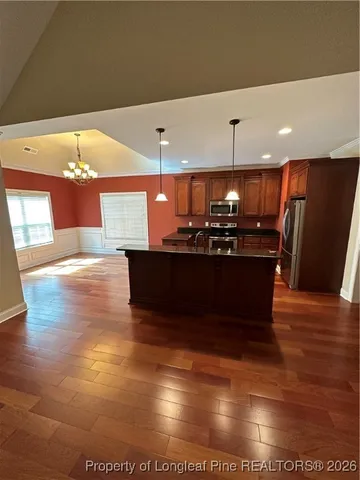 a view of a room with kitchen