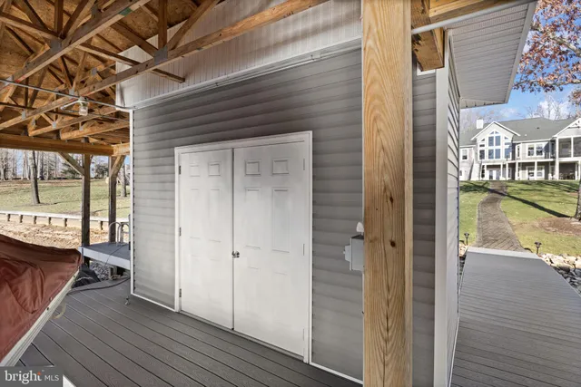 a kitchen with stainless steel appliances granite countertop a stove a microwave and a refrigerator