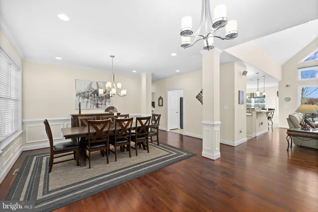 a balcony with table and chairs