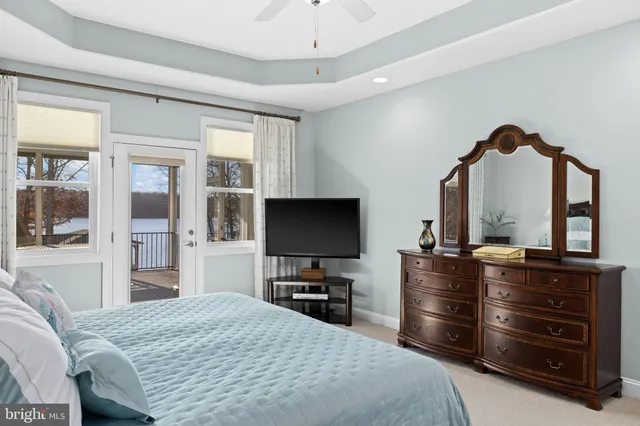 a view of a swimming pool with an outdoor seating