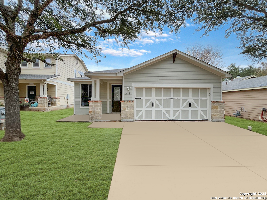 a view of a yard in front of house