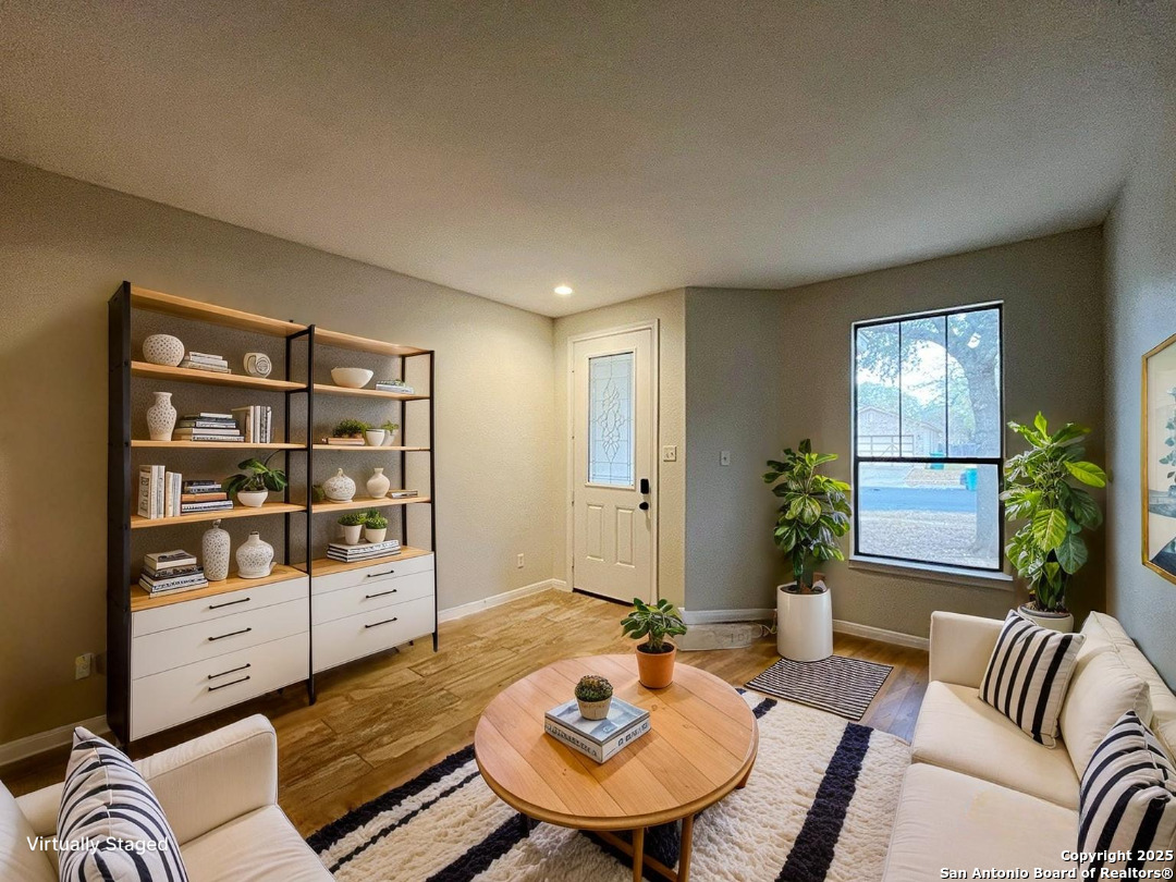 317 Sandy Shoal Boerne, TX 78006 - Photo 2 of 50 a living room with furniture and a window