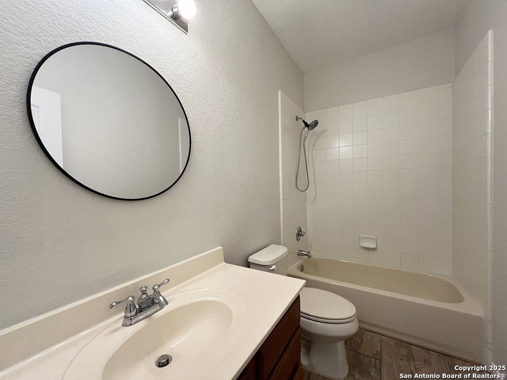 317 Sandy Shoal Boerne, TX 78006 - Photo 27 of 50 a bathroom with a sink and a mirror