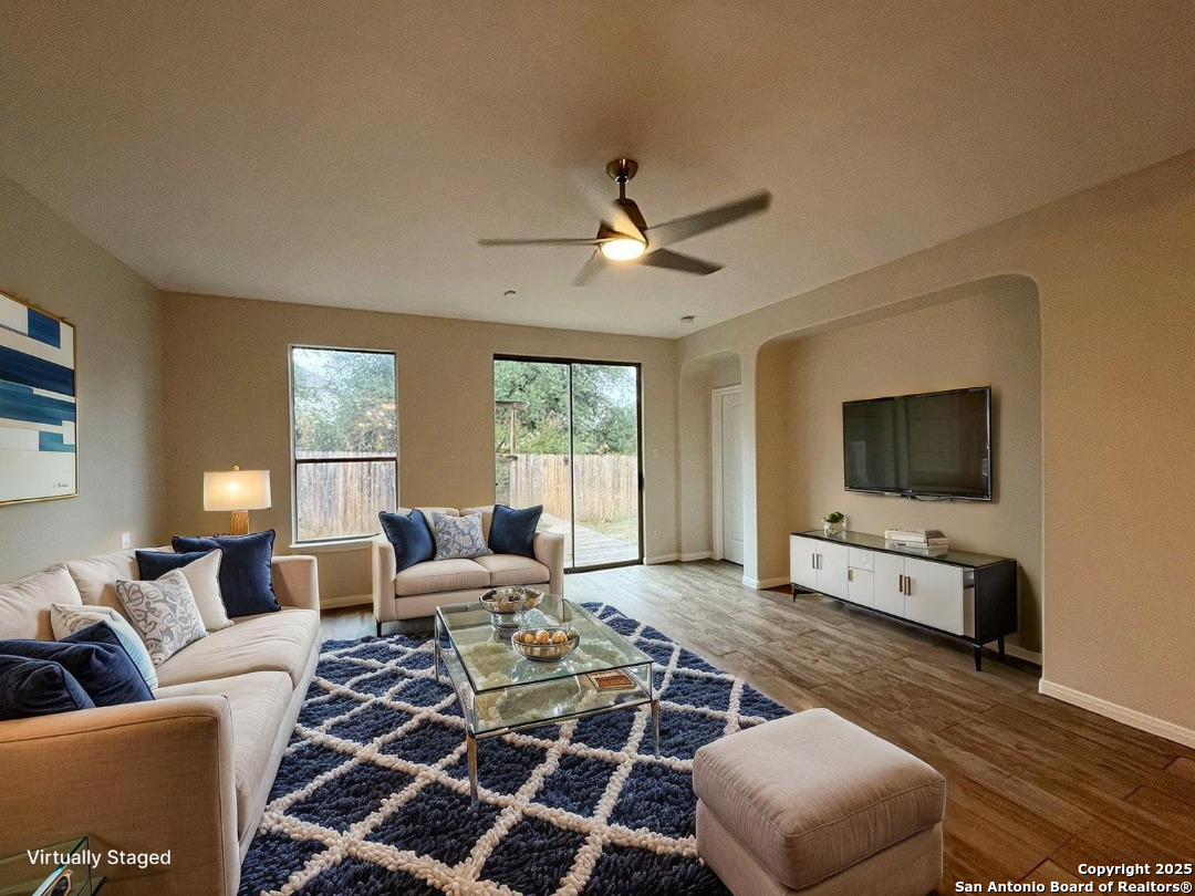 317 Sandy Shoal Boerne, TX 78006 - Photo 4 of 50 a living room with furniture and a flat screen tv