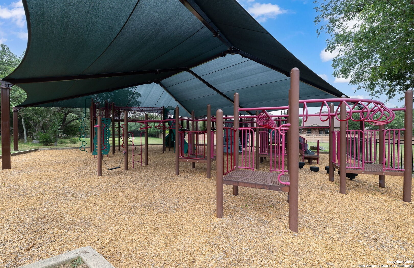 317 Sandy Shoal Boerne, TX 78006 - Photo 49 of 50 a view of a patio with a table and chairs