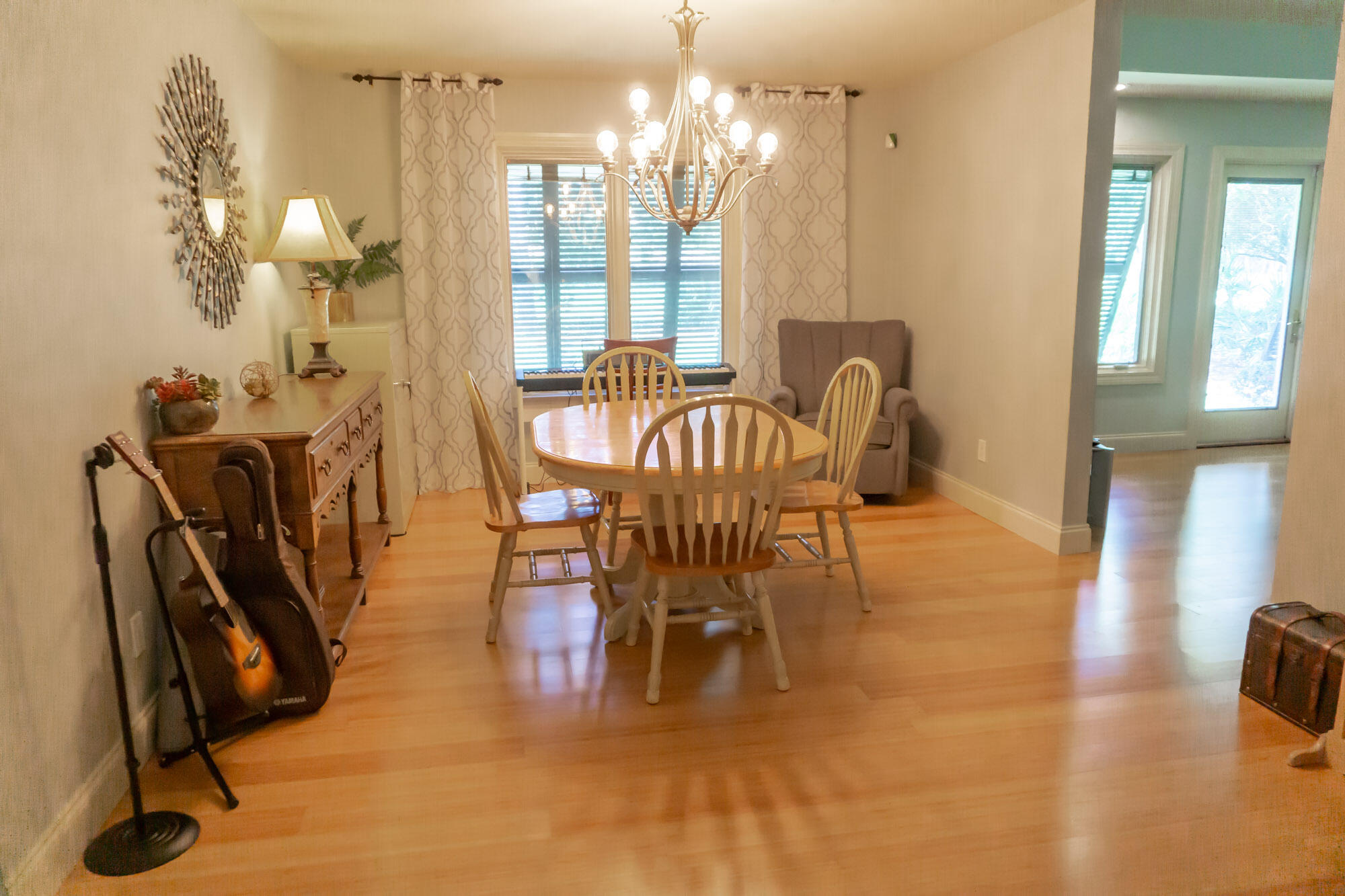372 Golfview Drive Miramar Beach, FL 32550 - Photo 28 of 66 a view of a dining room with furniture and a chandelier