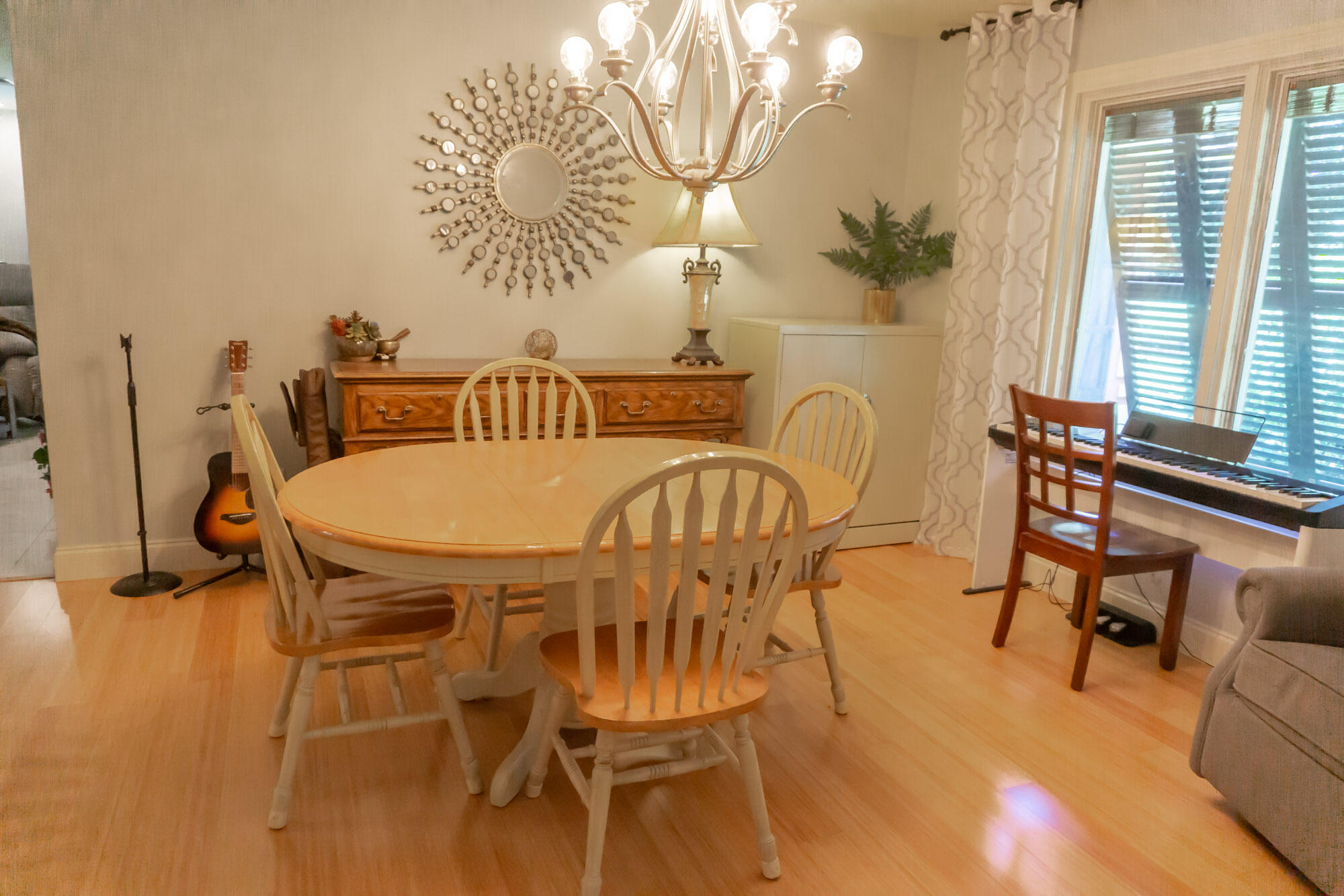 372 Golfview Drive Miramar Beach, FL 32550 - Photo 29 of 66 a dining room with furniture and wooden floor