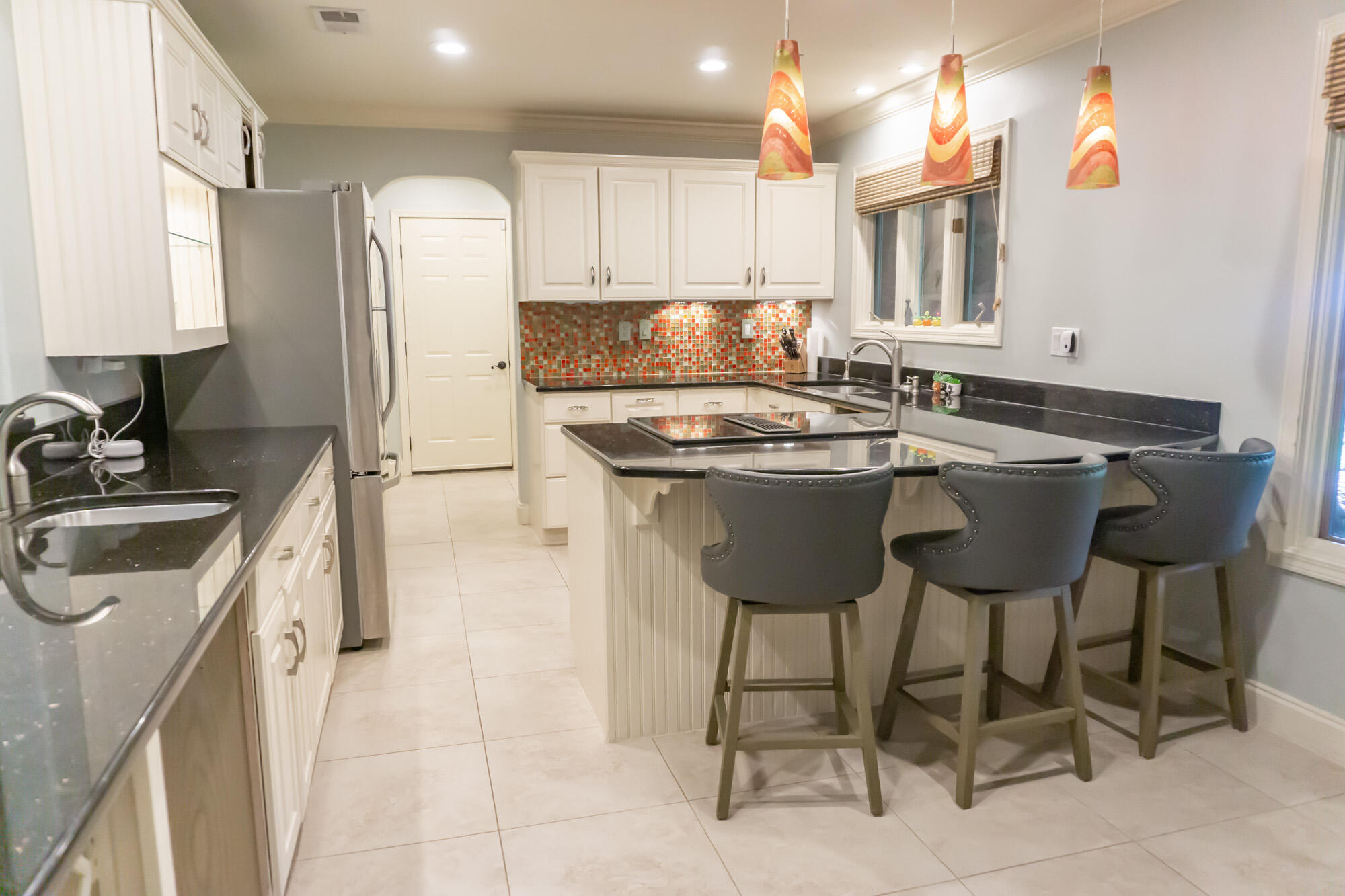 372 Golfview Drive Miramar Beach, FL 32550 - Photo 3 of 66 a kitchen with a sink cabinets and window