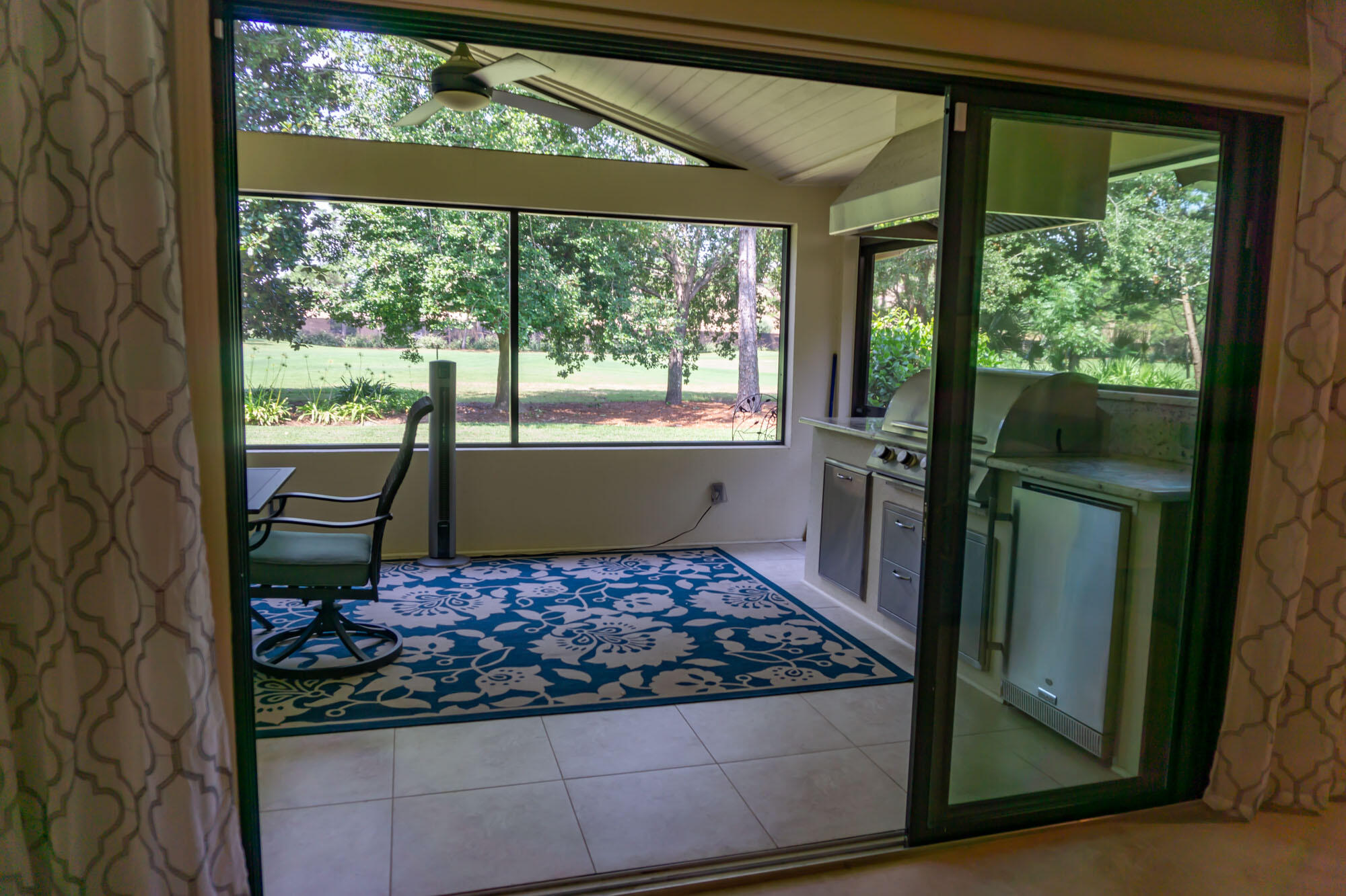 372 Golfview Drive Miramar Beach, FL 32550 - Photo 35 of 66 a view of a living room and a floor to ceiling window