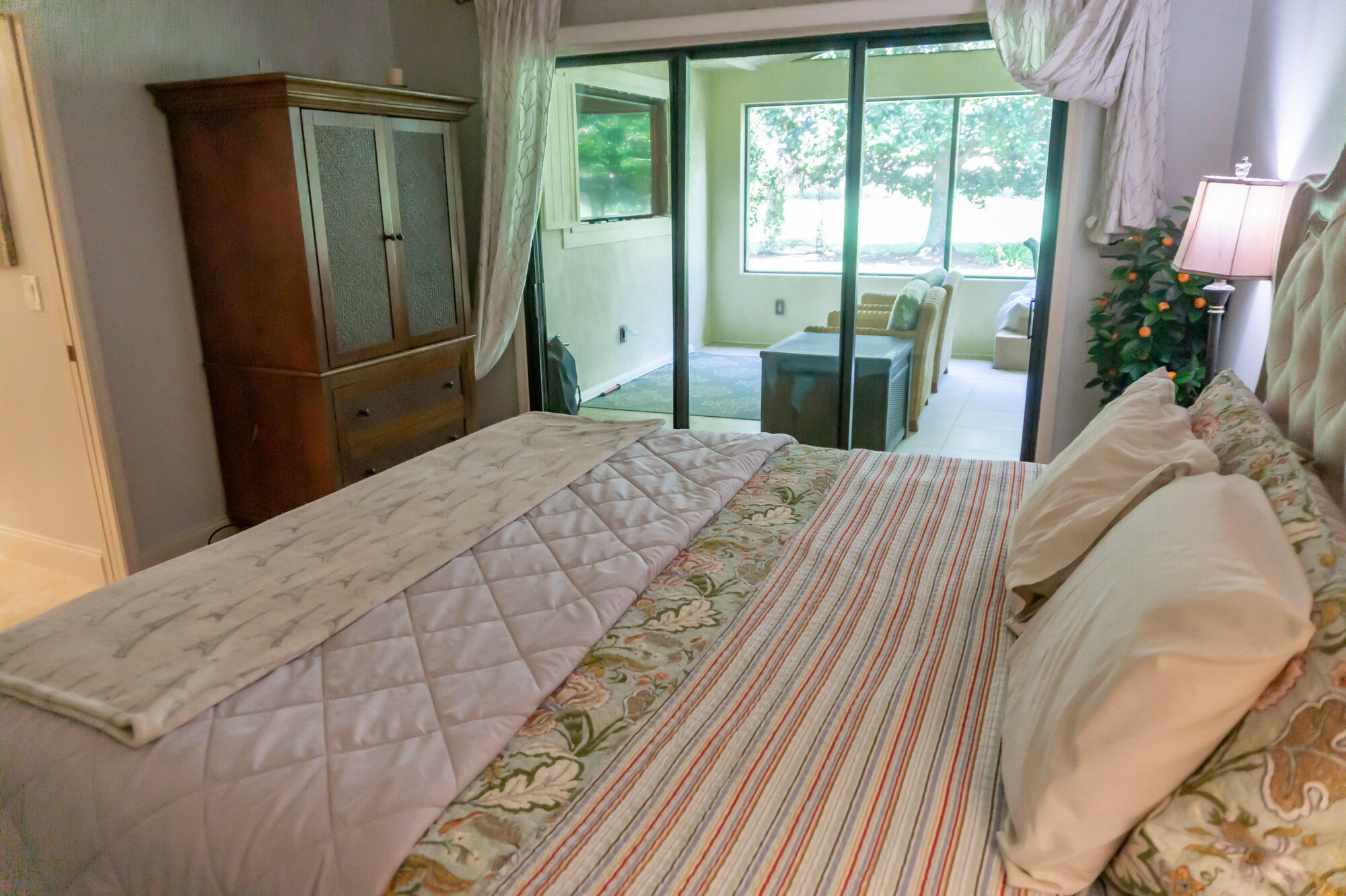 372 Golfview Drive Miramar Beach, FL 32550 - Photo 44 of 66 a bedroom with a bed and a mirror