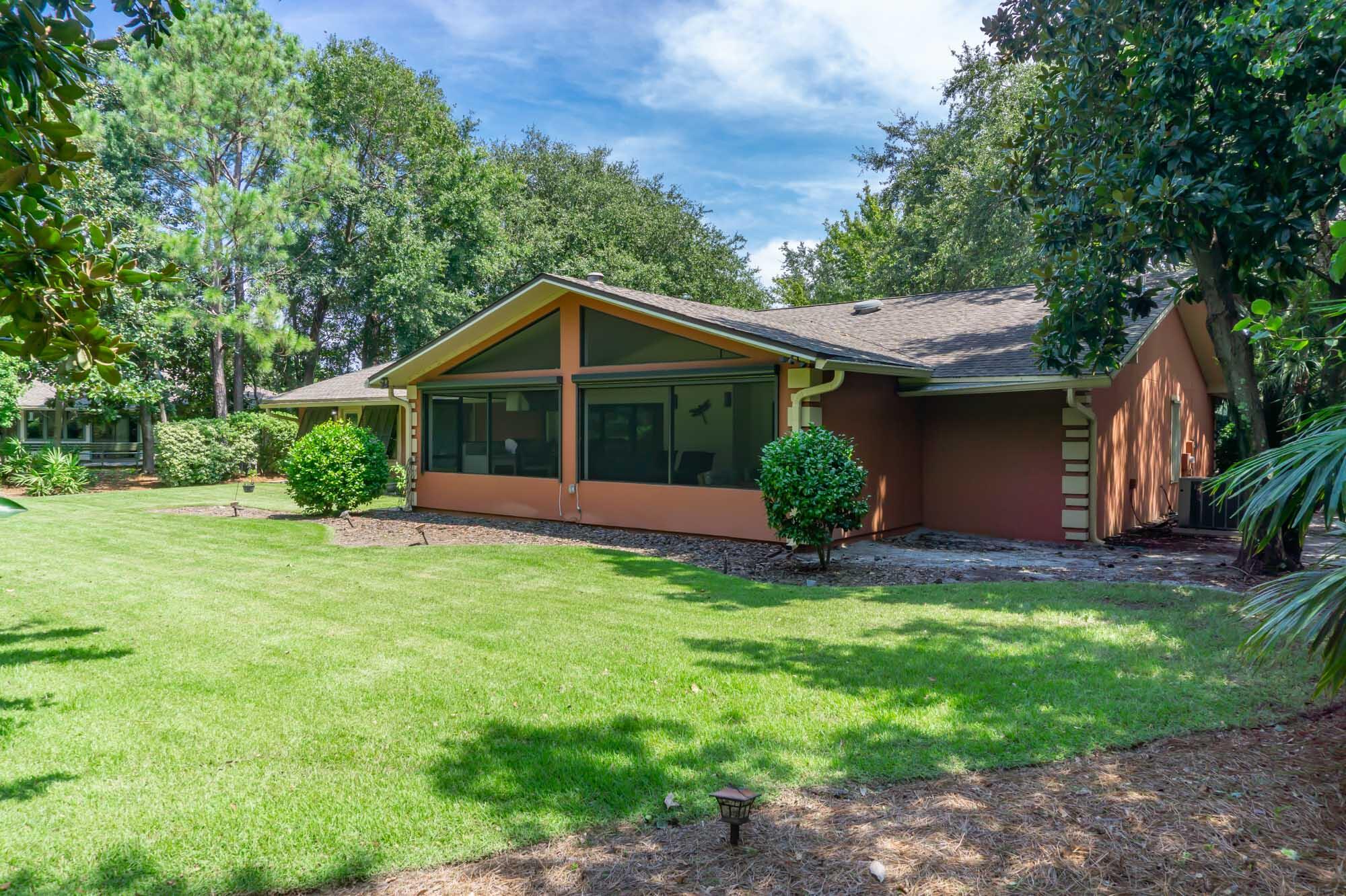 372 Golfview Drive Miramar Beach, FL 32550 - Photo 55 of 66 a view of a house with a yard and plants