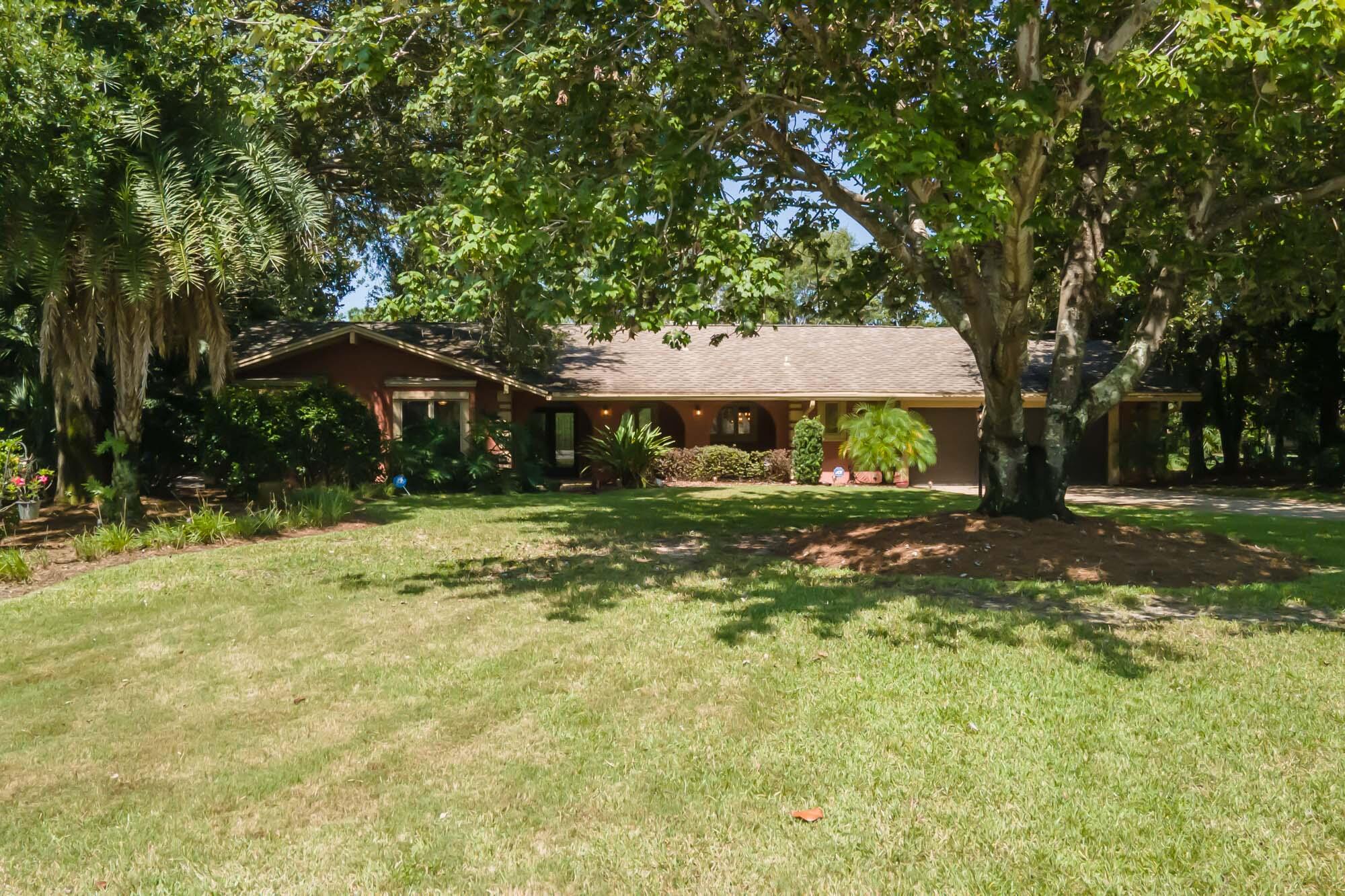 372 Golfview Drive Miramar Beach, FL 32550 - Photo 57 of 66 a front view of a house with a yard