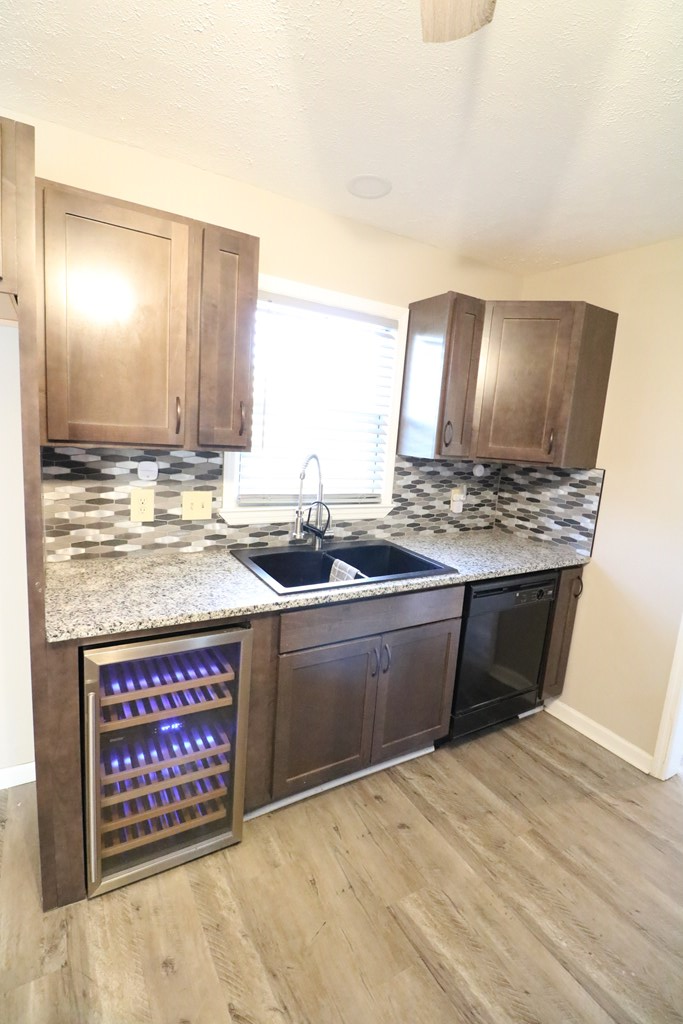 7 Primrose Court Columbus, GA 31907 - Photo 11 of 37 a kitchen with stainless steel appliances granite countertop a sink stove and cabinets