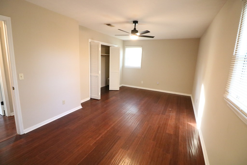 7 Primrose Court Columbus, GA 31907 - Photo 16 of 37 a view of wooden floor and windows in a room