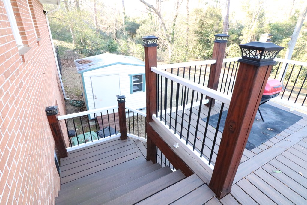 7 Primrose Court Columbus, GA 31907 - Photo 22 of 37 a view of deck with two chairs and wooden floor