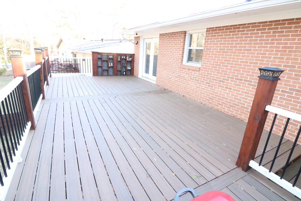 7 Primrose Court Columbus, GA 31907 - Photo 23 of 37 a view of a balcony with wooden floor