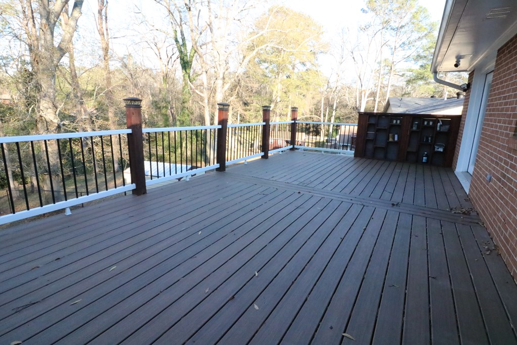 7 Primrose Court Columbus, GA 31907 - Photo 24 of 37 a view of a balcony with wooden floor