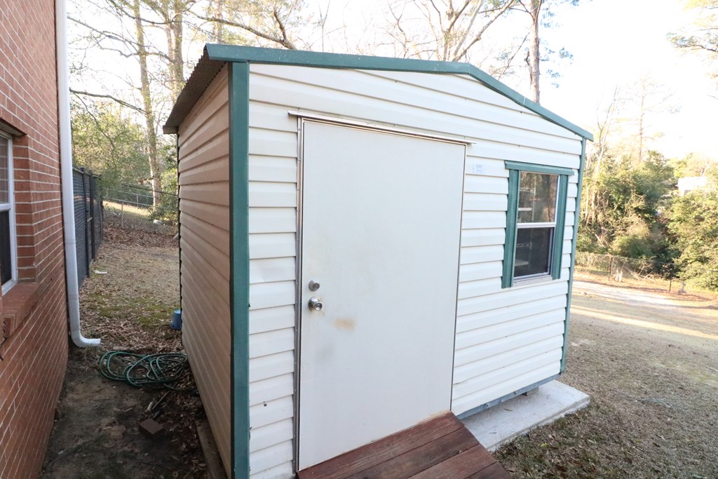 7 Primrose Court Columbus, GA 31907 - Photo 28 of 37 a view of a house with a yard
