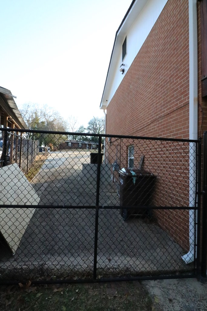 7 Primrose Court Columbus, GA 31907 - Photo 31 of 37 a view of a terrace with wooden floor and a floor to ceiling window