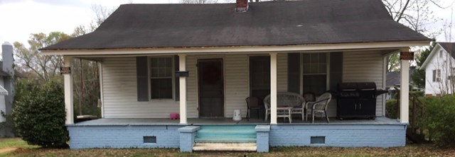 504 Cusseta Road Valley, AL 36854 - Photo 1 of 1 a view of house with large windows and plants