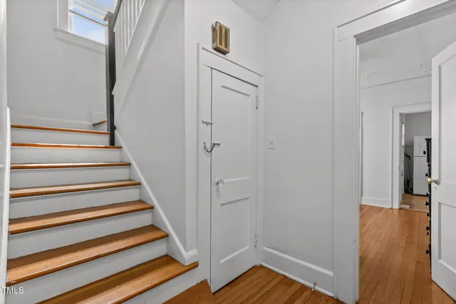 a bathroom with a toilet a sink and bathtub