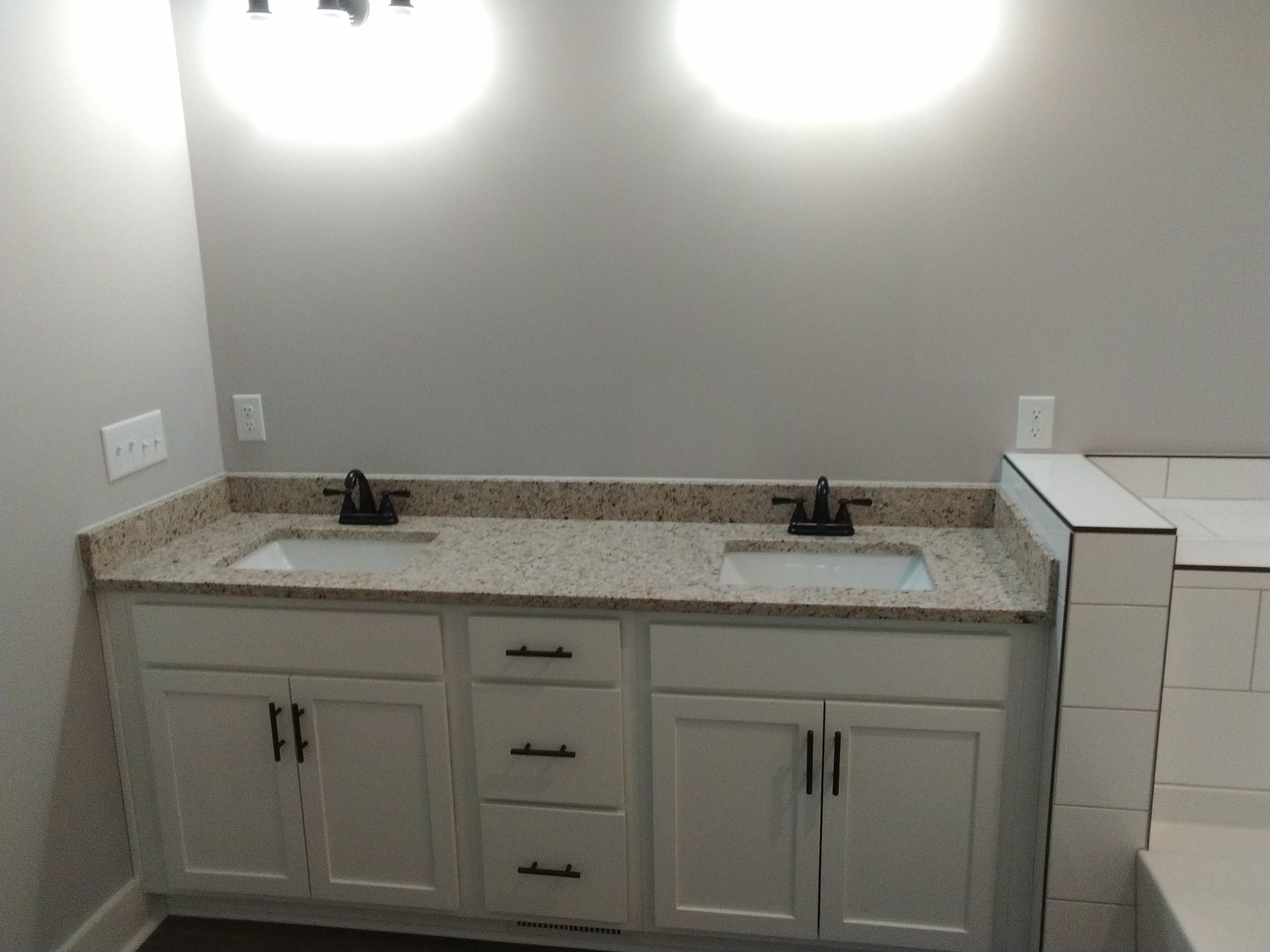 2006 McMahan Hollow Road Pleasant View, TN 37146 - Photo 15 of 20 a bathroom with a granite countertop sink and white cabinets