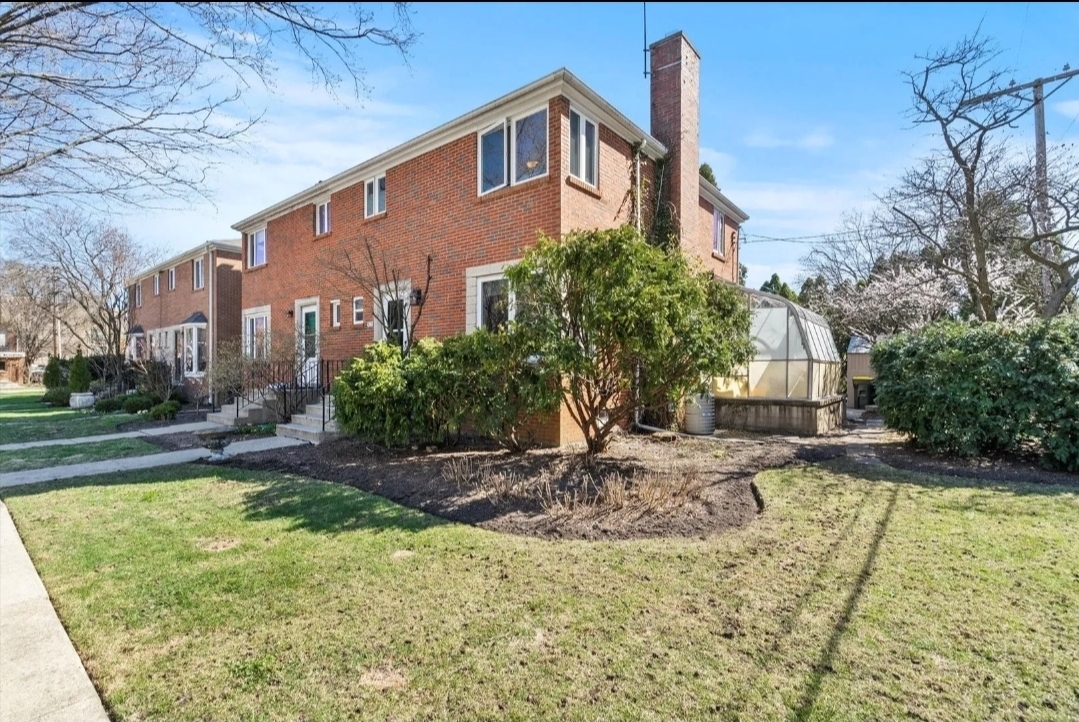 97 High Street Winnetka, IL 60093 - Photo 1 of 10 a view of a house with a yard and sitting area