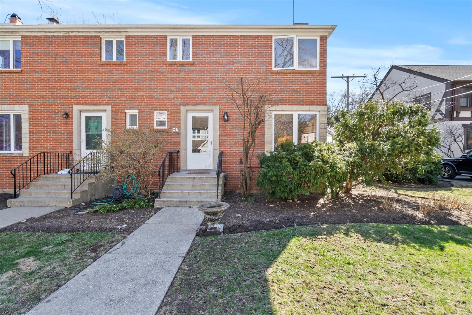 97 High Street Winnetka, IL 60093 - Photo 2 of 10 a front view of a house with garden