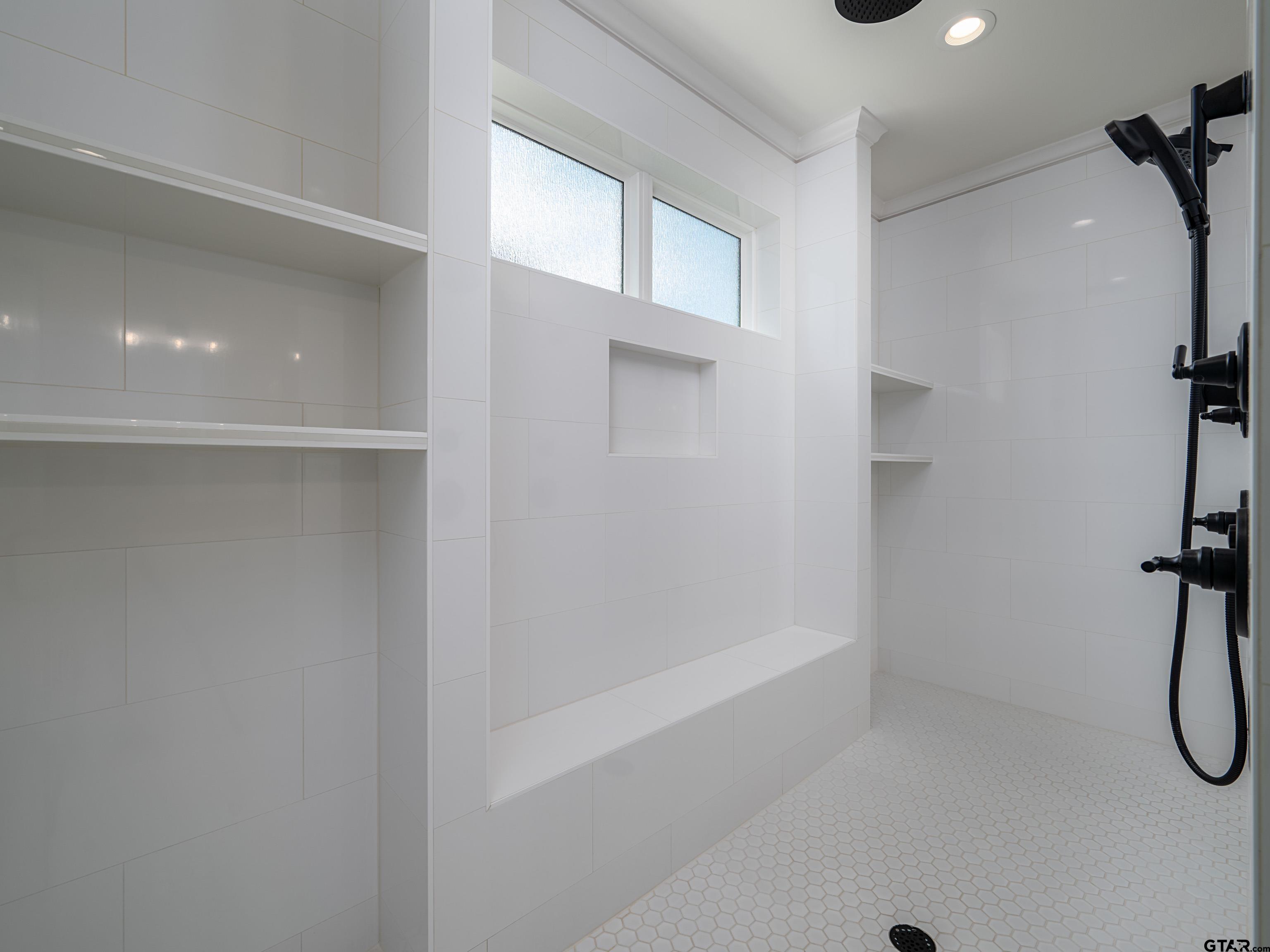 1555 Maple Lane Tyler, TX 75703 - Photo 22 of 43 a bathroom with a shower