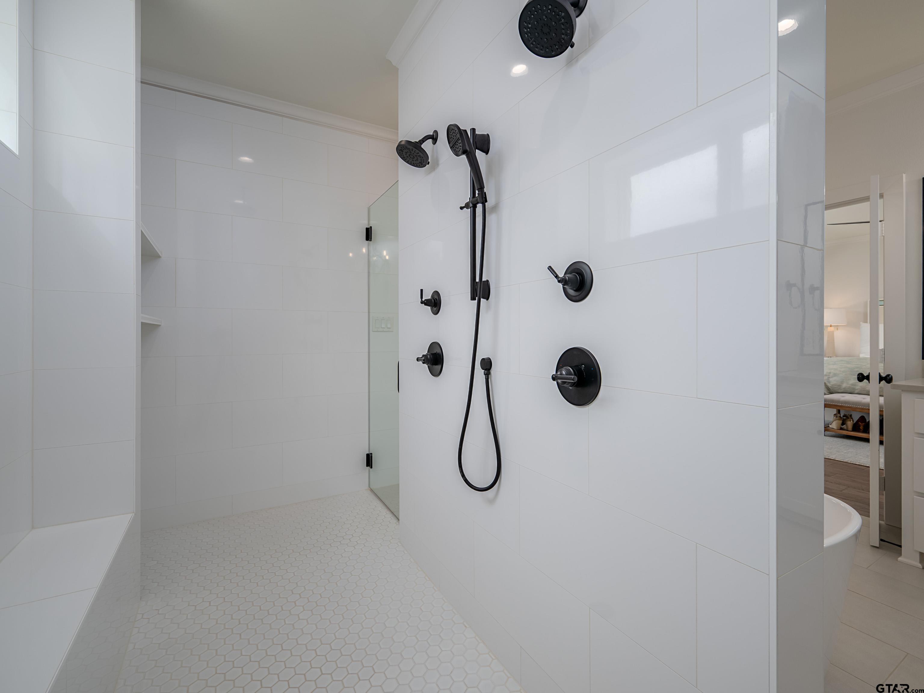 1555 Maple Lane Tyler, TX 75703 - Photo 23 of 43 a bathroom with a shower