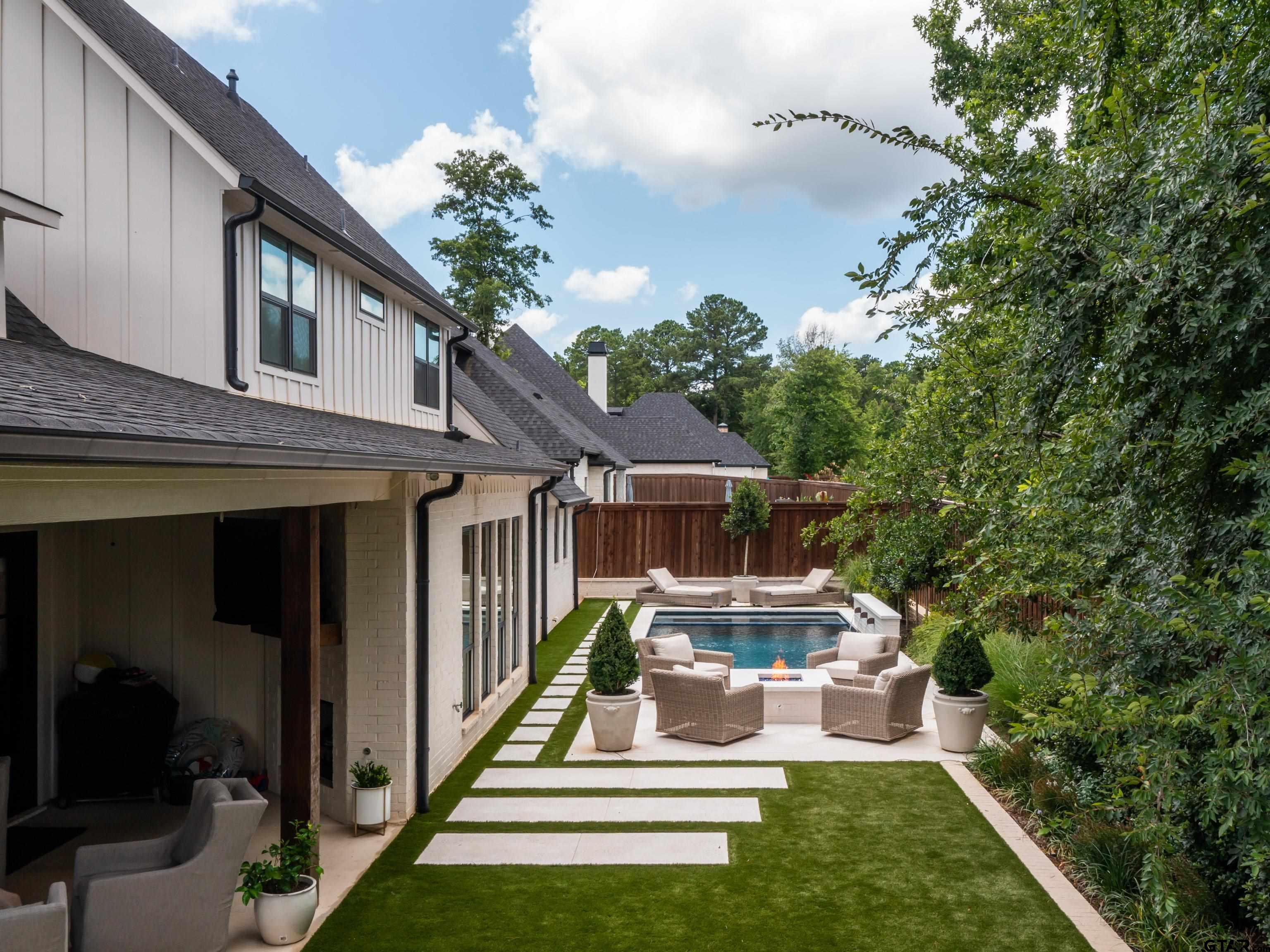 1555 Maple Lane Tyler, TX 75703 - Photo 35 of 43 a front view of a house with a yard