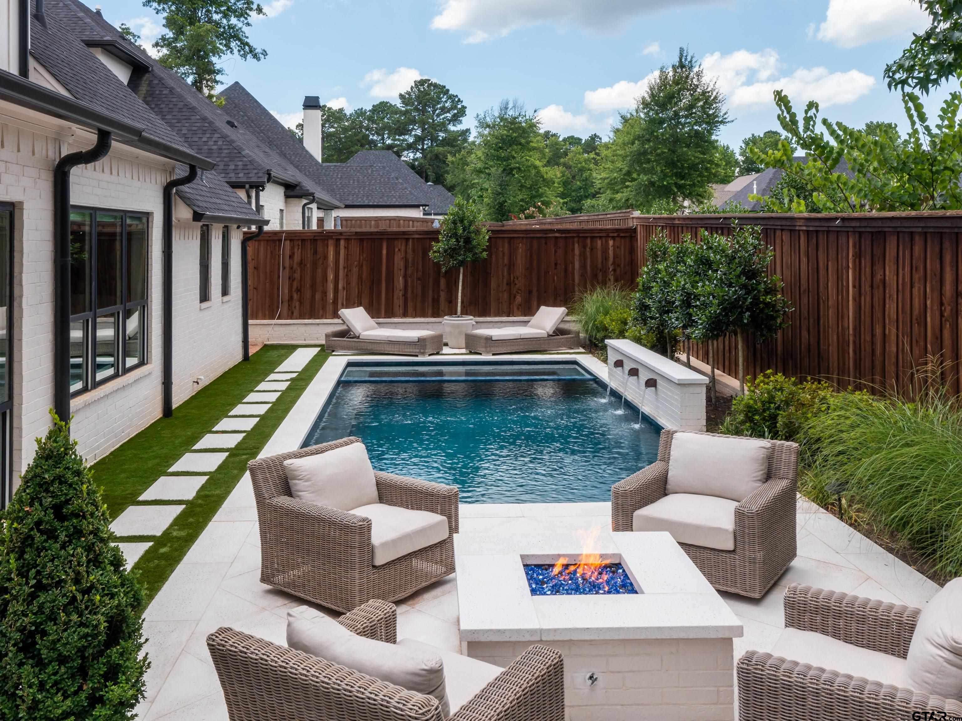 1555 Maple Lane Tyler, TX 75703 - Photo 37 of 43 a view of house with swimming pool and furniture