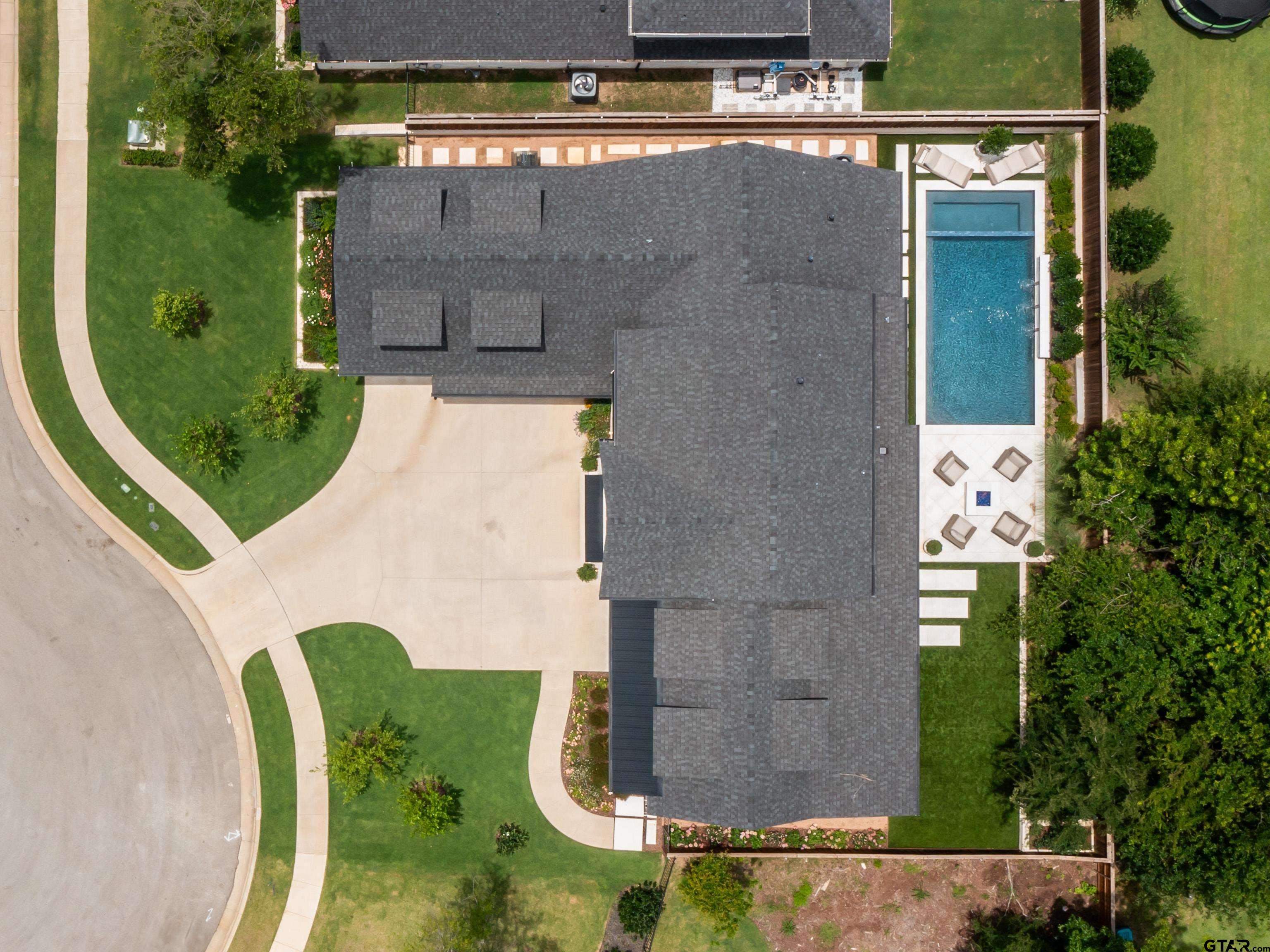 1555 Maple Lane Tyler, TX 75703 - Photo 4 of 43 an aerial view of a swimming pool