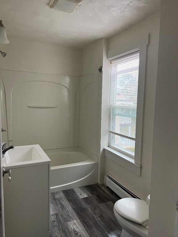 9 Pearl Street, Unit 2 Spencer, MA 01562 - Photo 10 of 12 a bathroom with a sink toilet and shower