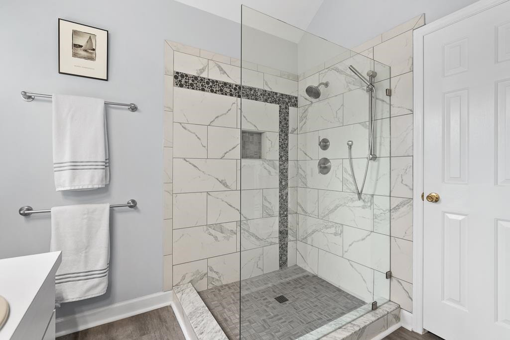 1609 Nesfield Place Raleigh, NC 27606 - Photo 19 of 30 New shower and tile make this bath something special! PRIMARY BEDROOM EN SUITE BATH