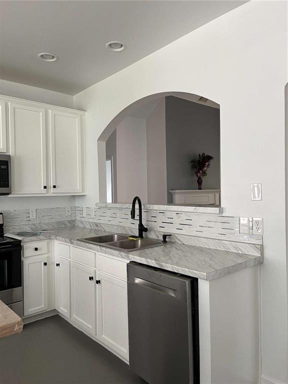 6127 Landers Loop Fairburn, GA 30213 - Photo 5 of 20 a kitchen with a sink and cabinets