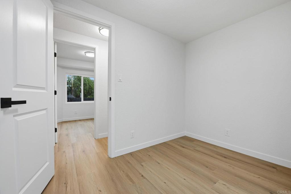 1333 Helix Street Spring Valley, CA 91977 - Photo 31 of 45 wooden floor in an empty room