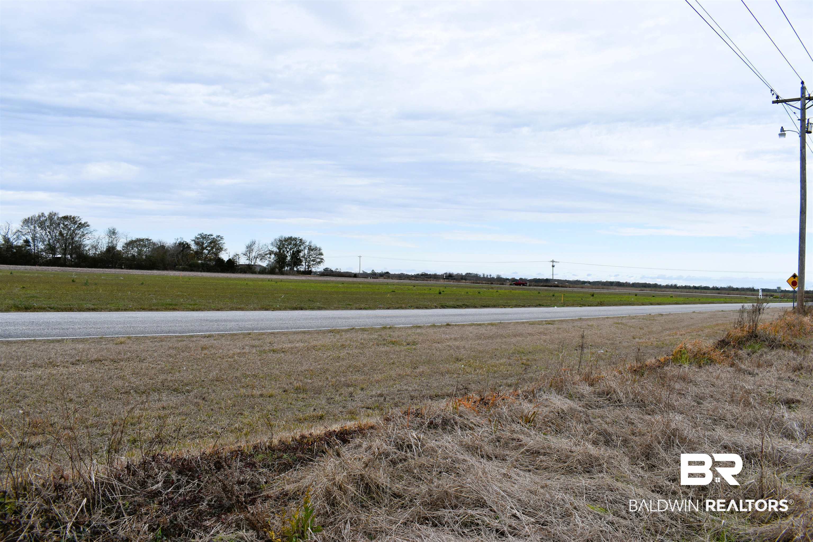 0 Daugherty Road Foley, AL 36535 - Photo 1 of 14 View of yard featuring a rural view