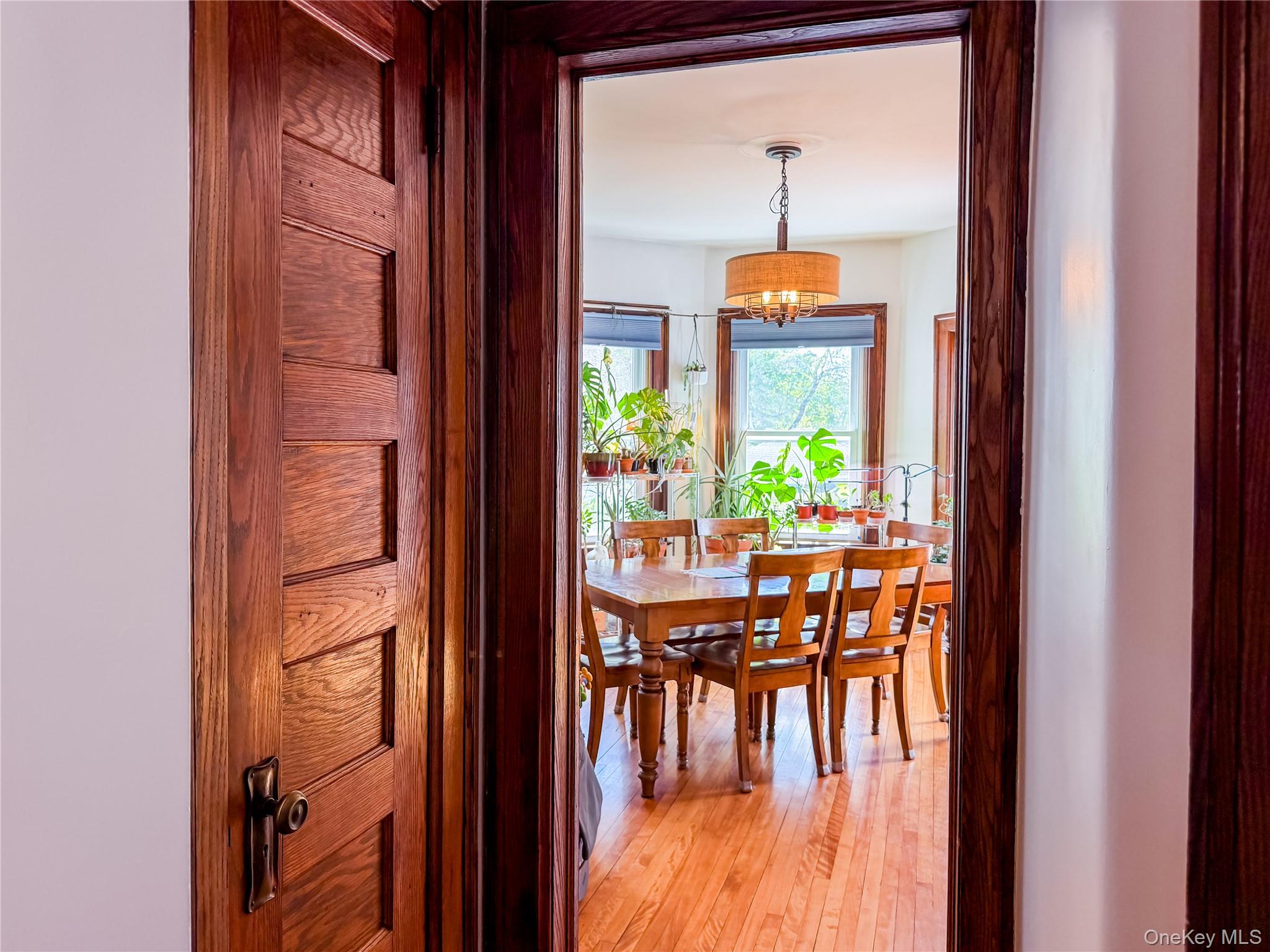 350 Smith Street Peekskill, NY 10566 - Photo 14 of 32 a dining room with furniture window and wooden floor