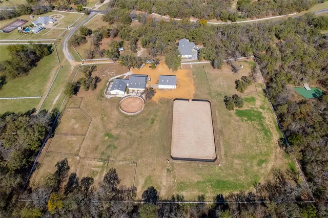 an aerial view of residential house with outdoor space