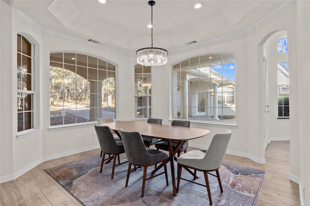 10984 Stagecoach Pass Pilot Point, TX 76258 - Photo 11 of 40 a view of a dining room with furniture window and outside view