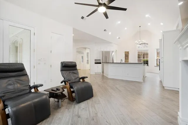 a view of a livingroom with furniture and a fireplace