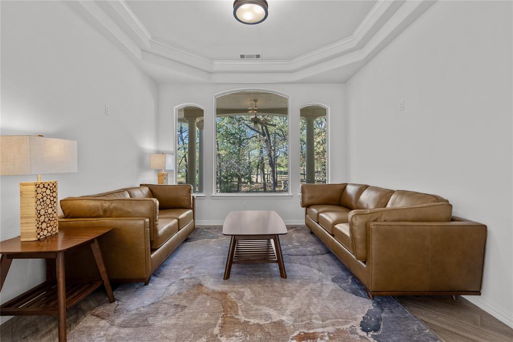 10984 Stagecoach Pass Pilot Point, TX 76258 - Photo 18 of 40 a living room with furniture and a large window